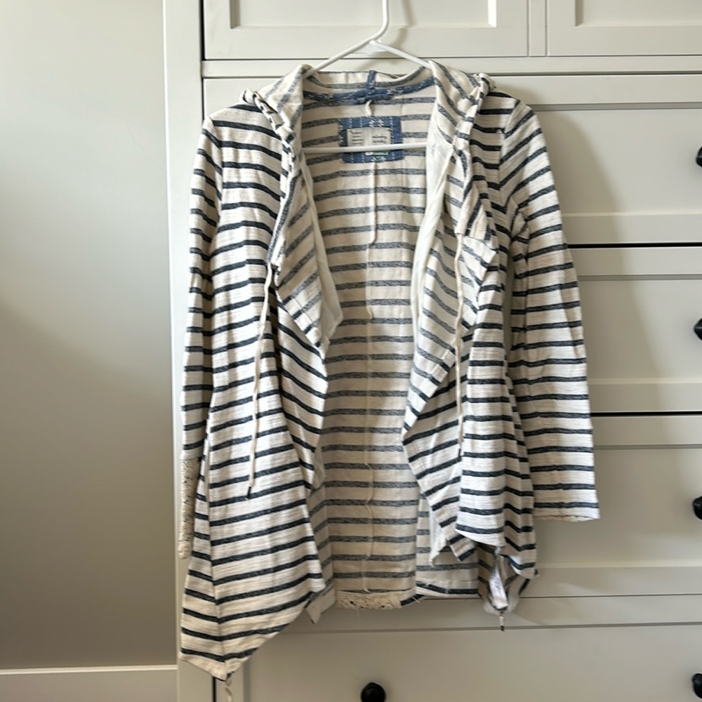 Navy blue and cream lightweight cardigan with lace details.